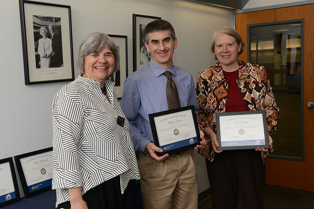 Danuta A. Nitecki, Dean of Libraries, poses with Matthew Lyons and Deb Morley during the Libraries Celebration Awards. Matthew and Deb hold their certificates.